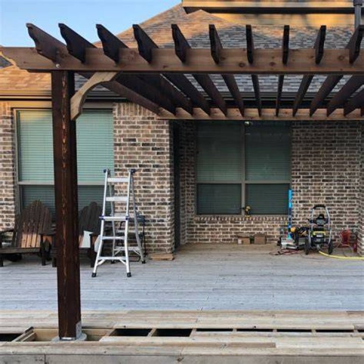 Is it safe to build a pergola over a fire pit
